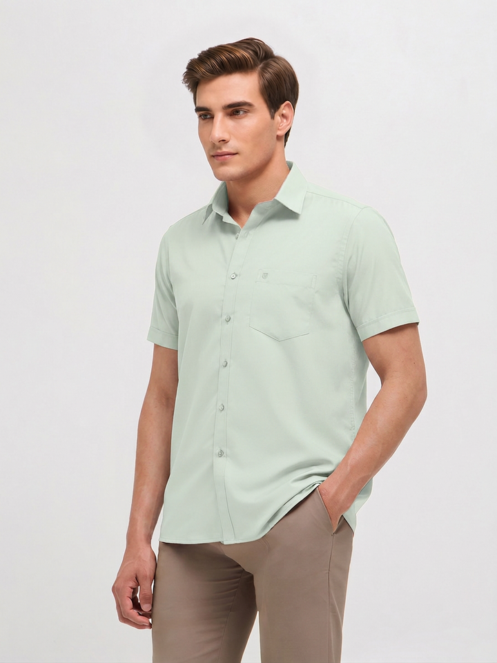 mint green shirt