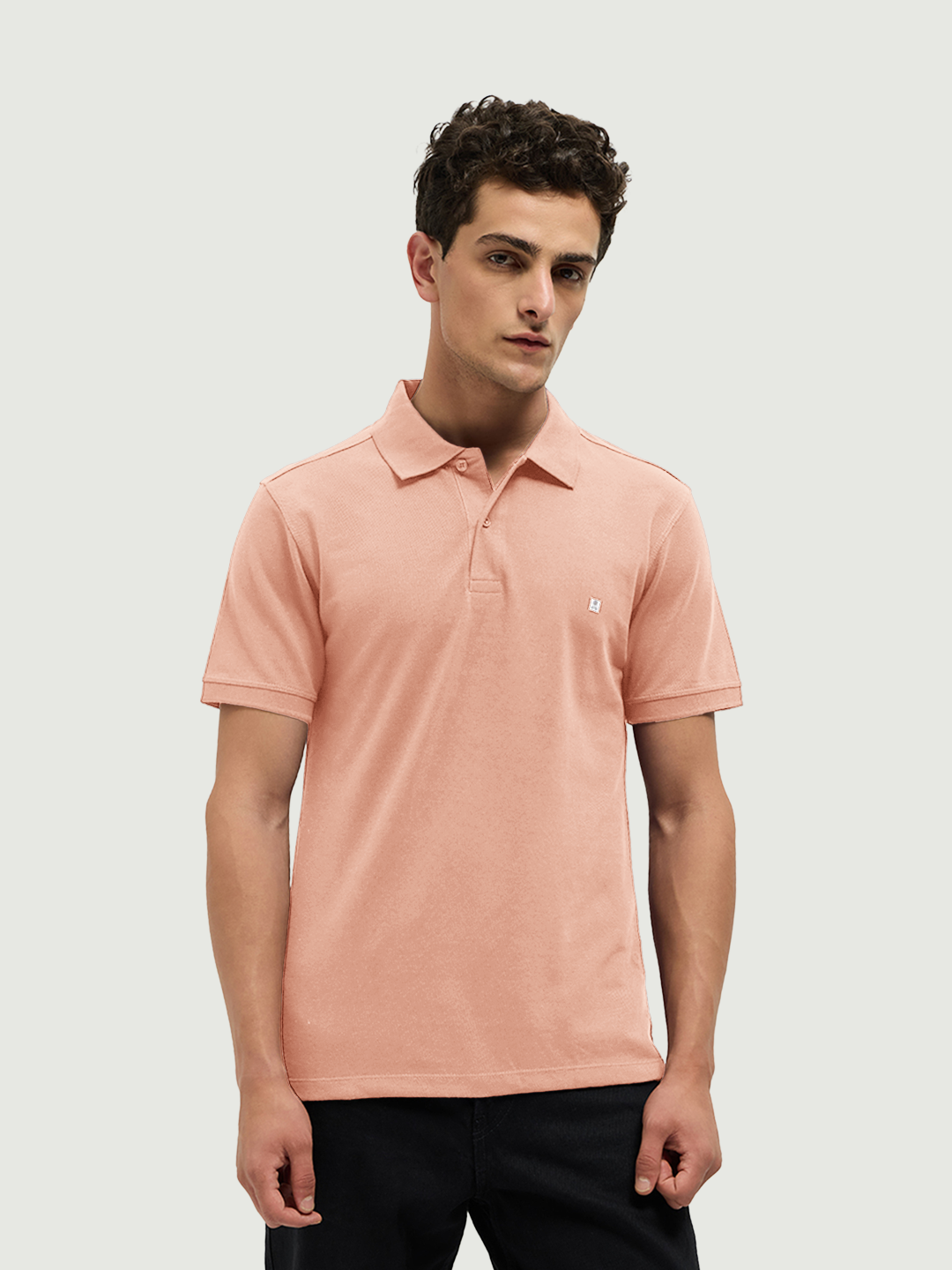 peach color shirt