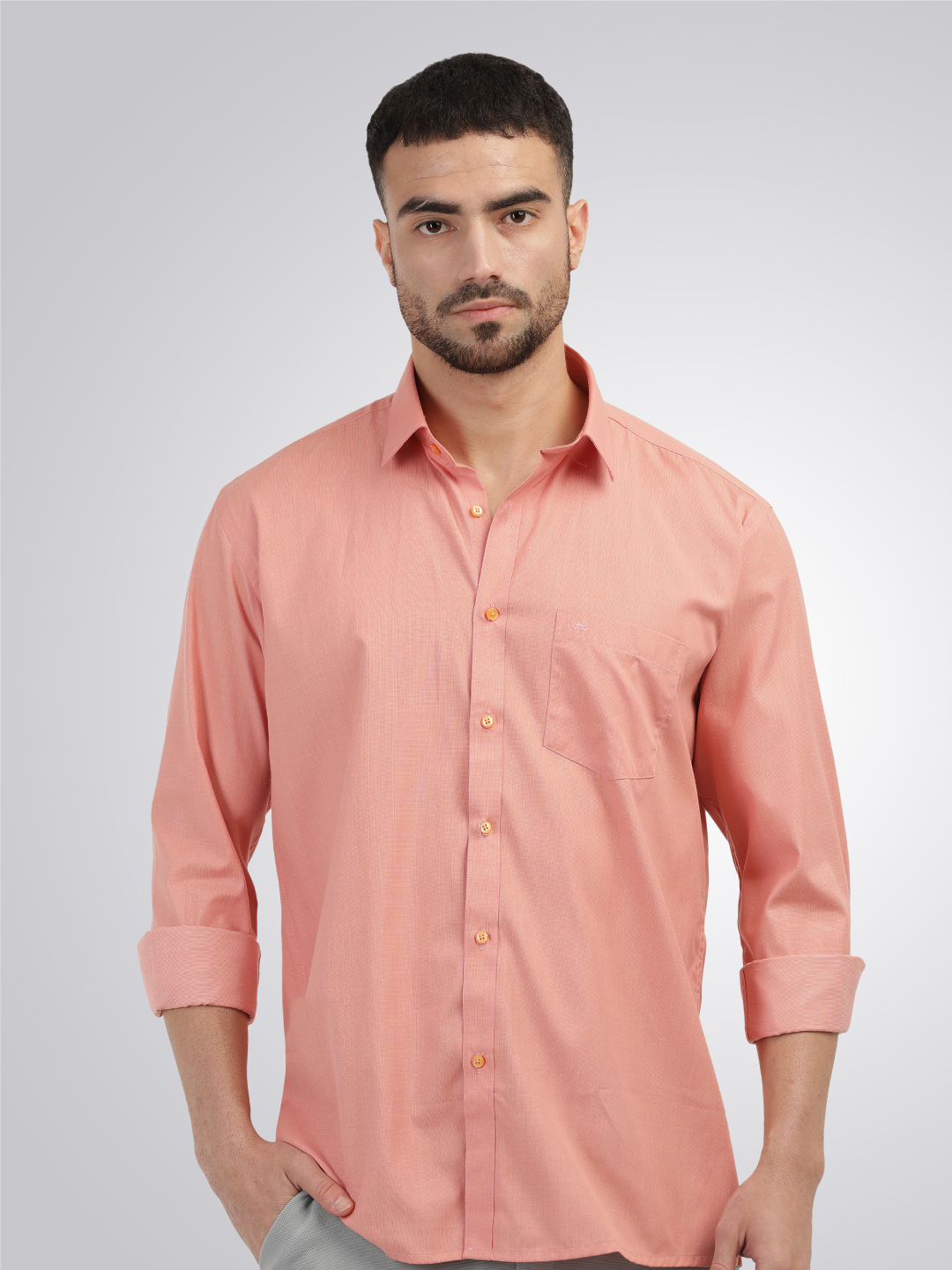 peach color shirt