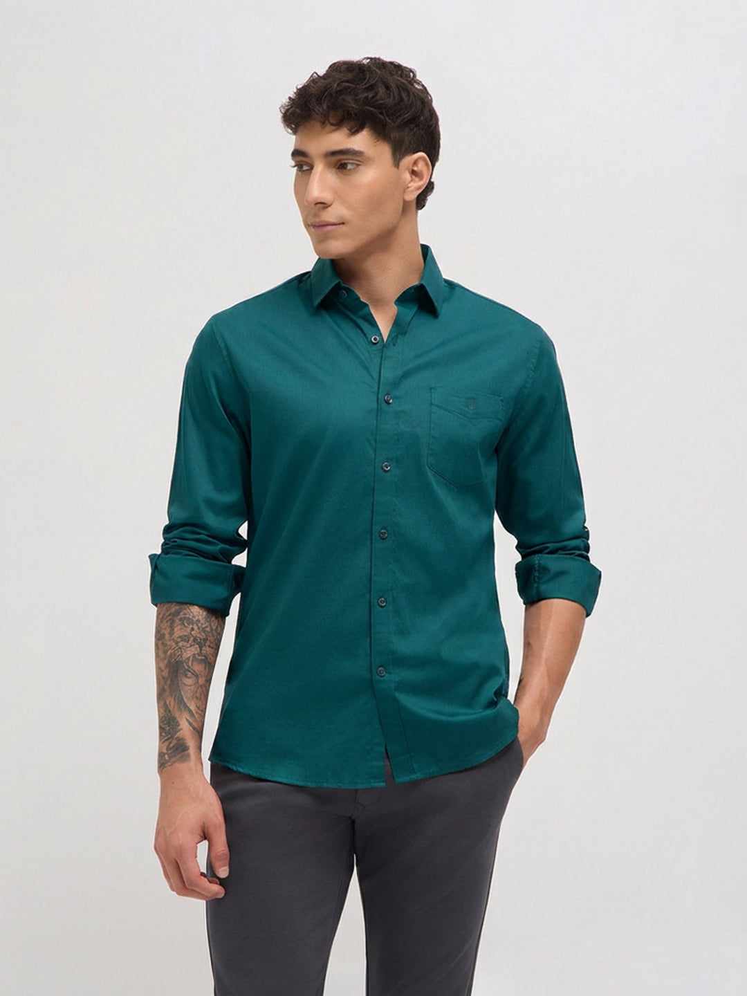 teal green shirt